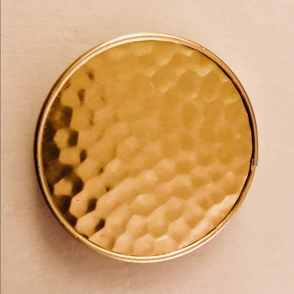 A gold pocket mirror. - Picture 2 of 4